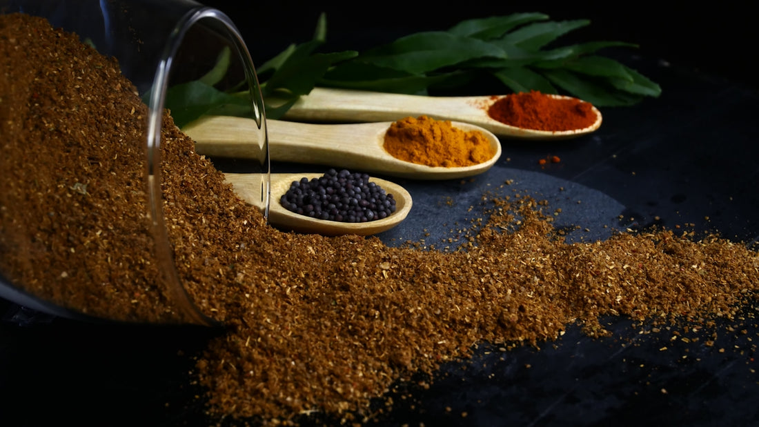various spices and spoons on a table