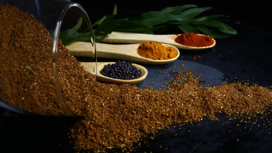 various spices and spoons on a table